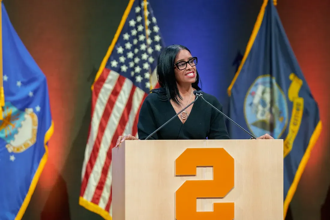 Person talking at a podium.